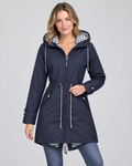 Noor | Sleek Waterproof Hooded Jacket Drawstring Waist – Navy blue – on-model hero