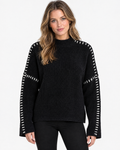 Aurev London Dionne sweater in Black worn by model - front hero