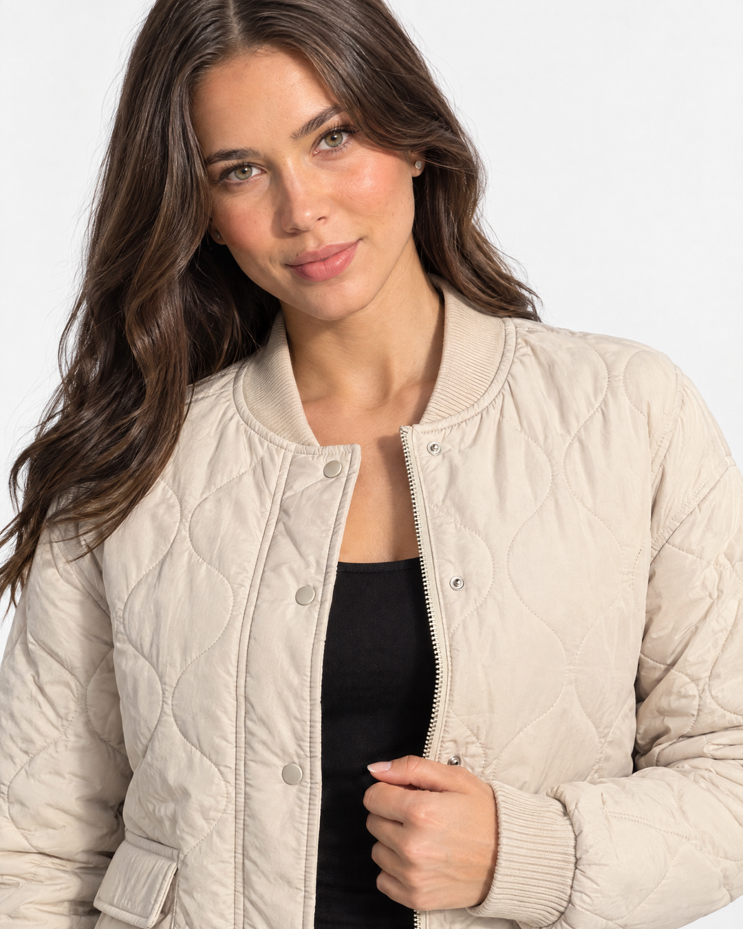 Aurev London Bronwen Polished Quilted Bomber Jacket in Beige - close up feature shot of quilting and zipper detail